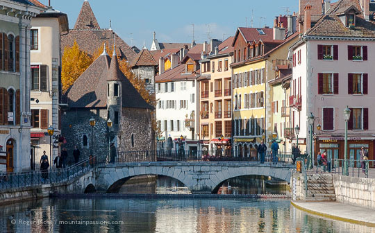 View of stone bridge with Annecy old town in background